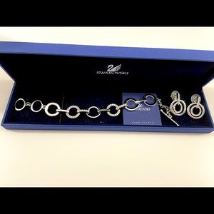 Brand New - Never worn Swarovski Bracelet with Matching earrings.